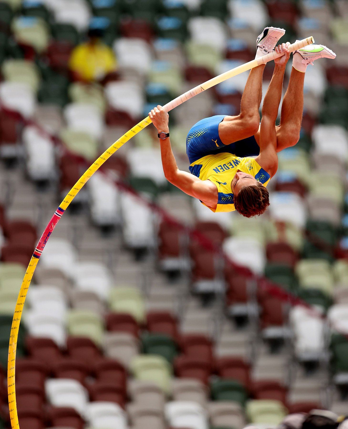 Mondo Duplantis clearing the bar in Sweden’s colours